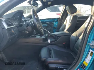 2019 BMW 4 Series 430i xDrive with VIN WBA4J3C58KBL08349, listed as a Copart auction lot 84267764 with 79,670 mi miles and Salvage Title. Bid and sale history available at DreamBid. Image 7.