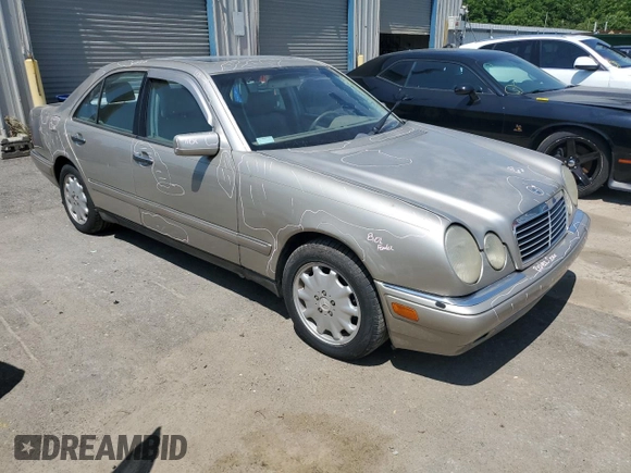 1999 Mercedes-Benz E-Class with VIN WDBJF65H2XA796208, listed as a Copart auction lot 62738904 with 156,283 mi miles and Salvage Title. Bid and sale history available at carsss.com. Image 4.