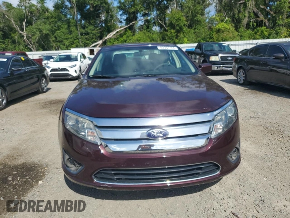 2012 Ford Fusion SE with VIN 3FAHP0HA0CR291458, listed as a Copart auction lot 63357165 with 122,992 mi miles and Salvage title. Bid and sale history available at DreamBid. Image 5.