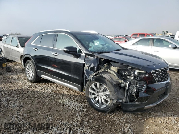 2021 Cadillac XT4 AWD Premium Luxury with VIN 1GYFZDR40MF080166, listed as a Copart auction lot 82883764 with 27,793 mi miles and Salvage Title. Bid and sale history available at carsss.com. Image 4.