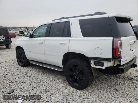 2015 GMC Yukon SLE with VIN 1GKS2AKCXFR107100, listed as a Copart auction lot 47050165 with 135,345 mi miles and Clean Title. Bid and sale history available at carsss.com. Image 2.