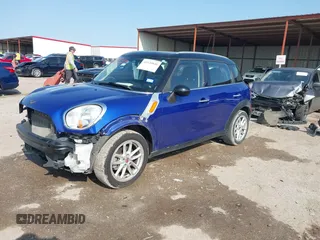 2015 MINI Countryman with VIN WMWZB3C56FWR43443, listed as a IAAI auction lot 41920848 with 91,192 mi miles and . Bid and sale history available at DreamBid. Image 18.