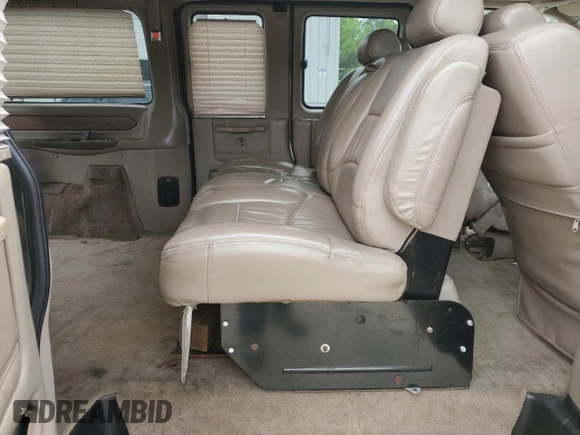 2004 Chevrolet Express Passenger with VIN 1GBFG15T441213195, listed as a Copart auction lot 54150365 with 141,782 mi miles and Clean title. Bid and sale history available at DreamBid. Image 11.