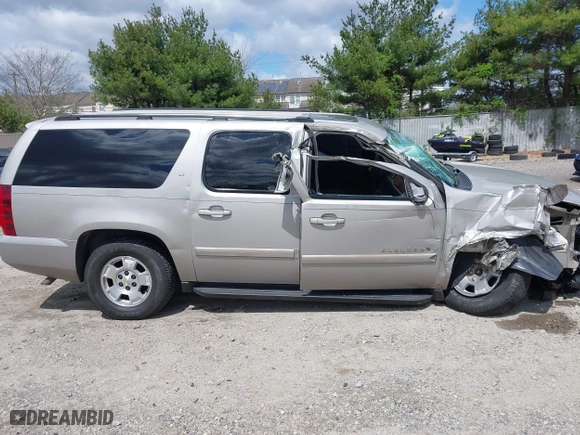 2007 Chevrolet Suburban LT with VIN 1GNFK16357J168000, listed as a IAAI auction lot 42049062 with 188,746 mi miles. Bid and sale history available at carsss.com. Image 13.