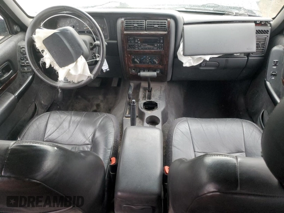 2000 Jeep Cherokee Limited with VIN 1J4FF68S0YL115669, listed as a Copart auction lot 85604524 with 0 mi miles and Salvage Title. Bid and sale history available at carsss.com. Image 8.