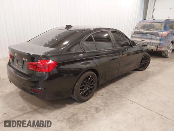 2018 BMW 3 Series 320i xDrive with VIN WBA8E5G5XJNU46855, listed as a IAAI auction lot 41526290 with 68,720 mi miles. Bid and sale history available at carsss.com. Image 4.