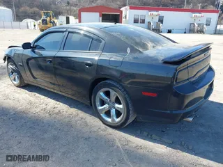 2014 Dodge Charger RT 100th Anniversary with VIN 2C3CDXCT4EH261977, listed as a IAAI auction lot 41815504 with 92,478 mi miles. Bid and sale history available at carsss.com. Image 3.