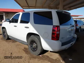 2007 Chevrolet Tahoe Police z VIN 1GNEC03097R414206, wystawiony jako IAAI lot #41698793 z przebiegiem 188 773 mil mil oraz . Historia ofert i sprzedaży dostępna na DreamBid. Obrazek 3.