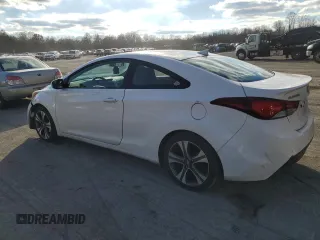 2014 Hyundai Elantra Coupe with VIN KMHDH6AHXEU029129, listed as a Copart auction lot 79674194 with 124,274 mi miles and Salvage Title. Bid and sale history available at carsss.com. Image 2.