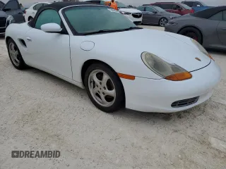 1998 Porsche Boxster с VIN WP0CA2987WU623387, выставлен на аукционе Copart как лот 76859594 с пробегом Не указан миль и Списание • Salvage title. История ставок и продаж доступна на DreamBid. Изображение 4.