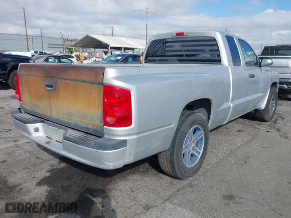 2011 Ram Dakota Bighorn/Lonestar with VIN 1D7RE3BK6BS636282, listed as a IAAI auction lot 41514885 with 295,847 mi miles. Bid and sale history available at carsss.com. Image 4.