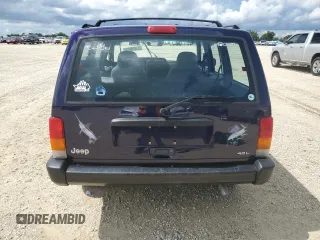 1998 Jeep Cherokee Sport with VIN 1J4FJ68S1WL149793, listed as a Copart auction lot 73976814 with 0 mi miles and Salvage Title. Bid and sale history available at carsss.com. Image 6.