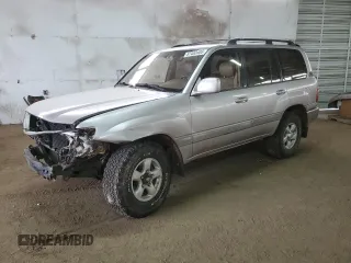 1999 Toyota Land Cruiser with VIN JT3HT05J1X0038590, listed as a Copart auction lot 87452404 with 232,244 mi miles and Salvage Title. Bid and sale history available at carsss.com. Image 1.