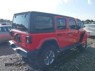 2020 Jeep Wrangler Unlimited Sahara High Altitude with VIN 1C4HJXEG2LW182641, listed as a IAAI auction lot 40130890 with 79,984 mi miles and . Bid and sale history available at DreamBid. Image 4.