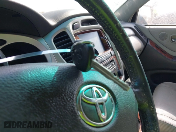 2006 Toyota Highlander z VIN JTEDW21A660007753, wystawiony jako IAAI lot #42157489 z przebiegiem 141 670 mil mil oraz . Historia ofert i sprzedaży dostępna na DreamBid. Obrazek 11.