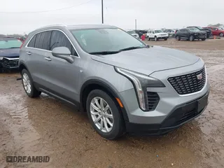 2023 Cadillac XT4 FWD Luxury with VIN 1GYAZAR49PF170591, listed as a IAAI auction lot 41283893 with 33,661 mi miles. Bid and sale history available at carsss.com. Image 1.