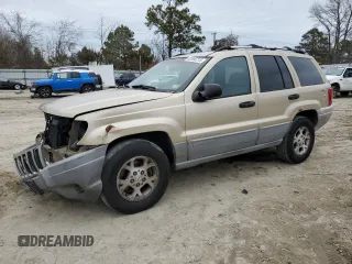 1999 Jeep Grand Cherokee Laredo z VIN 1J4G258S5XC795691, wystawiony jako Copart lot #42556215 z przebiegiem 320 188 mil mil oraz Szkoda całkowita • Salvage title. Historia ofert i sprzedaży dostępna na DreamBid. Obrazek 1.