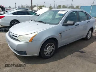 2008 Ford Focus SE z VIN 1FAHP35N38W289488, wystawiony jako IAAI lot #41993519 z przebiegiem 328 515 mil mil oraz . Historia ofert i sprzedaży dostępna na DreamBid. Obrazek 2.