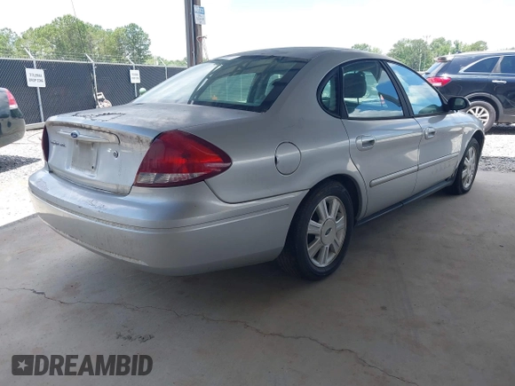 2005 Ford Taurus SEL with VIN 1FAFP56235A209879, listed as a IAAI auction lot 42537452 with 231,151 mi miles and . Bid and sale history available at DreamBid. Image 4.