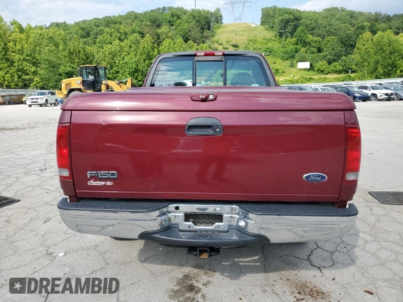 1999 Ford F-150 with VIN 1FTZF1823XNB69430, listed as a Copart auction lot 60218645 with Not provided miles and Salvage title. Bid and sale history available at DreamBid. Image 6.