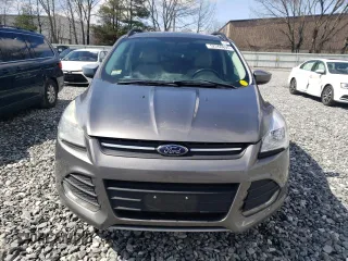 2014 Ford Escape SE with VIN 1FMCU9G9XEUA96094, listed as a Copart auction lot 52260805 with 143,791 mi miles and Clean Title. Bid and sale history available at DreamBid. Image 5.