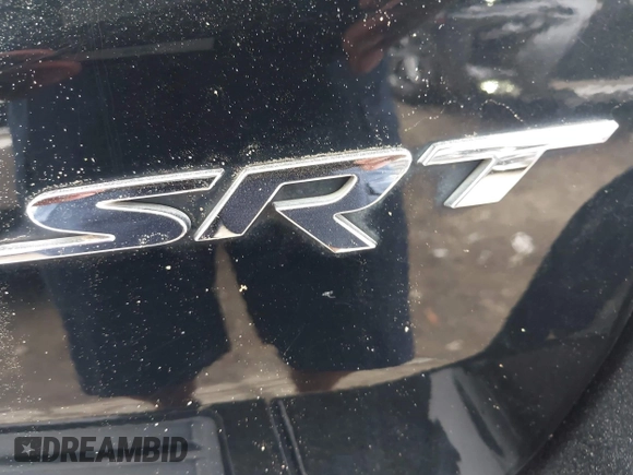 2017 Jeep Grand Cherokee SRT z VIN 1C4RJFDJ7HC683240, wystawiony jako IAAI lot #41919995 z przebiegiem 122 030 mil mil oraz . Historia ofert i sprzedaży dostępna na DreamBid. Obrazek 20.