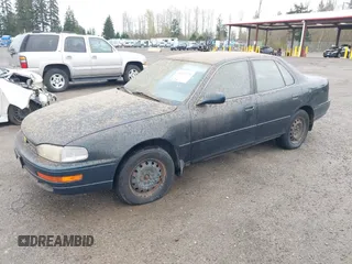 1994 Toyota Camry LE z VIN JT2GK12E1R0036423, wystawiony jako IAAI lot #41922375 z przebiegiem 211 529 mil mil oraz . Historia ofert i sprzedaży dostępna na DreamBid. Obrazek 2.