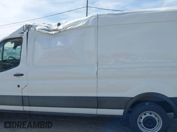 2024 Ford Transit Cargo with VIN 1FTBR1C8XRKA46961, listed as a IAAI auction lot 41823255 with 4,292 mi miles and . Bid and sale history available at DreamBid. Image 15.