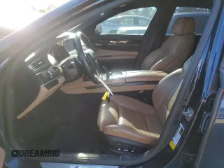 2012 BMW 7 Series 750i z VIN WBAKA8C52CCY37618, wystawiony jako Copart lot #87510215 z przebiegiem 113 512 mil mil oraz Czysty tytuł • Clean title. Historia ofert i sprzedaży dostępna na DreamBid. Obrazek 7.