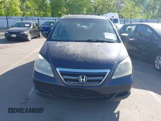 2006 Honda Odyssey EX-L z VIN 5FNRL38696B014658, wystawiony jako IAAI lot #42215974 z przebiegiem 273 015 mil mil oraz . Historia ofert i sprzedaży dostępna na DreamBid. Obrazek 6.