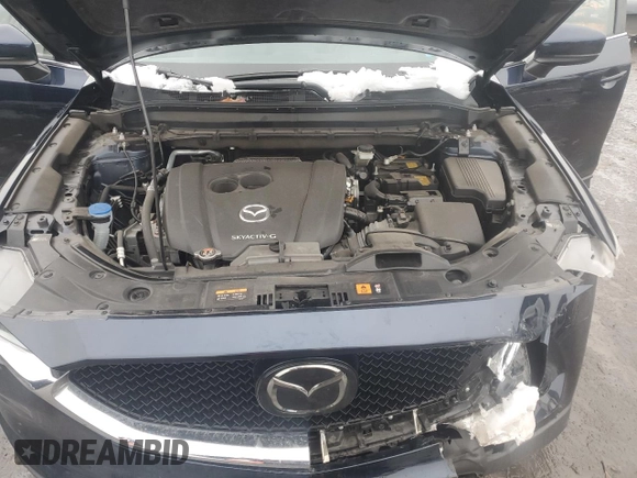 2021 Mazda CX-5 Grand Touring with VIN JM3KFBDM0M0391325, listed as a Copart auction lot 44863215 with 21,997 mi miles and Salvage Title. Bid and sale history available at DreamBid. Image 14.