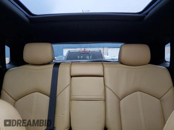 2016 Cadillac SRX Premium Collection with VIN 3GYFNDE33GS551297, listed as a Copart auction lot 85690144 with 115,542 mi miles and Clean title. Bid and sale history available at DreamBid. Image 10.