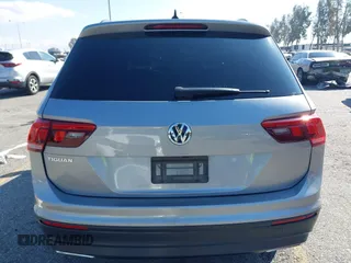 2021 Volkswagen Tiguan S with VIN 3VV1B7AX6MM131036, listed as a IAAI auction lot 41742604 with 55,155 mi miles and . Bid and sale history available at DreamBid. Image 17.