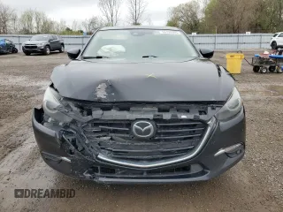 2017 Mazda 3 Grand Touring z VIN JM1BN1M33H1119719, wystawiony jako Copart lot #55728905 z przebiegiem 217 372 mil mil oraz Szkoda całkowita • Salvage title. Historia ofert i sprzedaży dostępna na DreamBid. Obrazek 5.