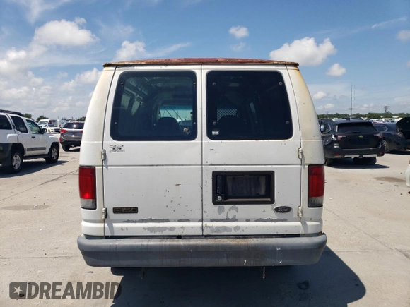 2004 Ford Econoline Cargo with VIN 1FTRE14W04HA41300, listed as a Copart auction lot 64768745 with 169,865 mi miles and Clean title. Bid and sale history available at DreamBid. Image 6.