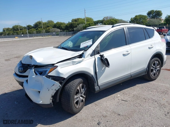 2017 Toyota RAV4 LE with VIN JTMZFREV7HJ143483, listed as a IAAI auction lot 41804683 with 129,319 mi miles. Bid and sale history available at carsss.com. Image 2.