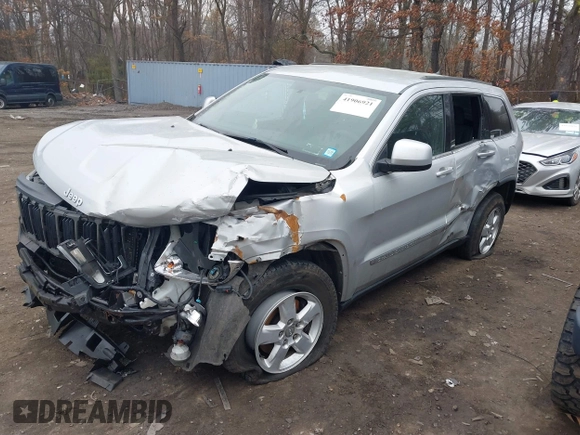 2013 Jeep Grand Cherokee Laredo with VIN 1C4RJFAGXDC537367, listed as a IAAI auction lot 41906921 with 124,679 mi miles. Bid and sale history available at carsss.com. Image 2.