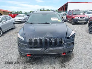 2017 Jeep Cherokee Trailhawk z VIN 1C4PJMBS1HW569093, wystawiony jako IAAI lot #42286940 z przebiegiem 121 876 mil mil oraz . Historia ofert i sprzedaży dostępna na DreamBid. Obrazek 12.