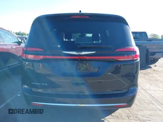 2022 Chrysler Pacifica Touring L with VIN 2C4RC1BG9NR117538, listed as a IAAI auction lot 42318518 with 103,311 mi miles and . Bid and sale history available at DreamBid. Image 17.