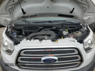 2017 Ford Transit z VIN 1FTYR1YM8HKA78211, wystawiony jako Copart lot #53779825 z przebiegiem 16 834 mil mil oraz Szkoda całkowita • Salvage title. Historia ofert i sprzedaży dostępna na DreamBid. Obrazek 12.
