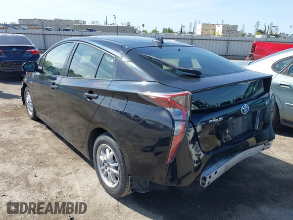 2016 Toyota Prius Two with VIN JTDKBRFU9G3021083, listed as a IAAI auction lot 41986733 with 117,227 mi miles and . Bid and sale history available at DreamBid. Image 3.