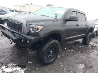2012 Toyota Tundra Limited with VIN 5TFHW5F15CX231213, listed as a IAAI auction lot 41399901 with 262,185 mi miles and . Bid and sale history available at DreamBid. Image 2.