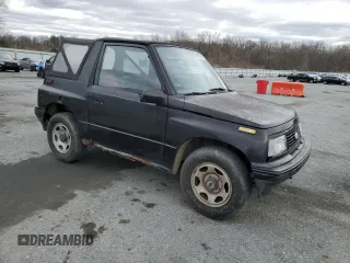 1993 Geo Tracker z VIN 2CNBE18U6P6927170, wystawiony jako Copart lot #48283925 z przebiegiem 178 293 mil mil oraz Tytuł czysty. Historia ofert i sprzedaży dostępna na DreamBid. Obrazek 4.