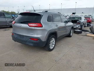 2016 Jeep Cherokee 75th Anniversary with VIN 1C4PJLCB1GW229823, listed as a IAAI auction lot 41848844 with 94,884 mi miles. Bid and sale history available at carsss.com. Image 4.