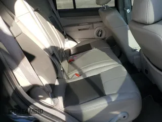 2010 Jeep Commander Limited with VIN 1J4RG5GT1AC129682, listed as a Copart auction lot 55215375 with 36,906 mi miles and Salvage title. Bid and sale history available at DreamBid. Image 11.