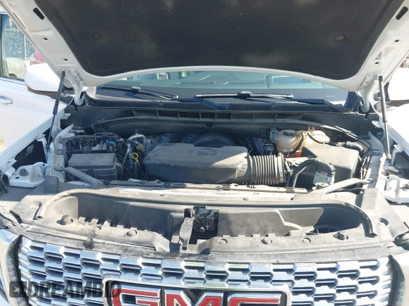 2023 GMC Yukon Denali with VIN 1GKS1DKL2PR303909, listed as a IAAI auction lot 42018679 with 65,532 mi miles. Bid and sale history available at carsss.com. Image 10.