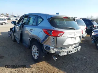 2014 Mazda CX-5 Sport with VIN JM3KE2BE9E0330345, listed as a IAAI auction lot 41377335 with 103,340 mi miles and . Bid and sale history available at carsss.com. Image 3.