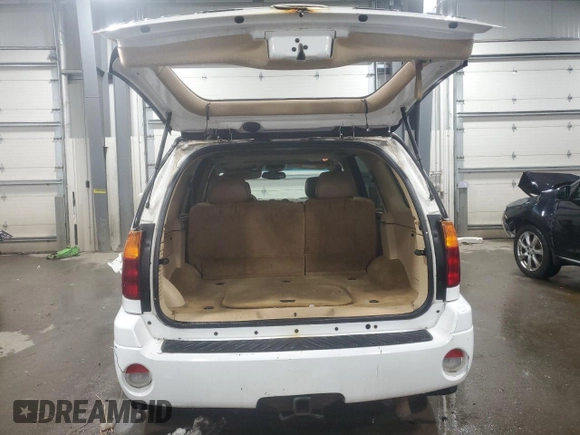 2002 GMC Envoy SLT with VIN 1GKDT13S722453300, listed as a Copart auction lot 45795025 with 158,290 mi miles and Salvage Title. Bid and sale history available at carsss.com. Image 6.