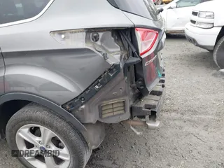 2014 Ford Escape SE with VIN 1FMCU0GX4EUB37846, listed as a IAAI auction lot 41913346 with 131,982 mi miles. Bid and sale history available at carsss.com. Image 6.