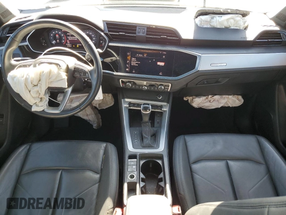 2021 Audi Q3 Premium z VIN WA1AUCF38M1067676, wystawiony jako Copart lot #71621704 z przebiegiem 77 395 mil mil oraz Szkoda całkowita • Salvage title. Historia ofert i sprzedaży dostępna na DreamBid. Obrazek 8.